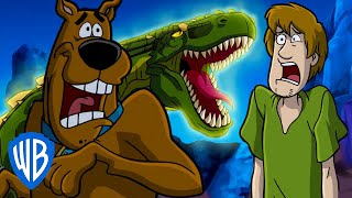 ScoobyDoo  Dangerous Dinosaur  WB Kids [upl. by Aisatal]